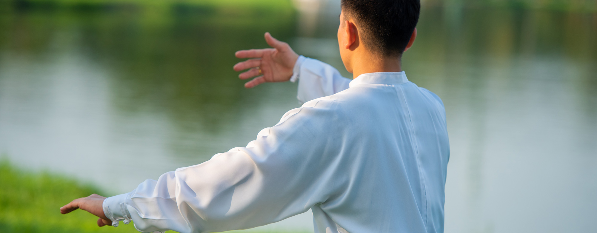 Man Practicing Tai Chi - Holistic Health through One Movement at a Time